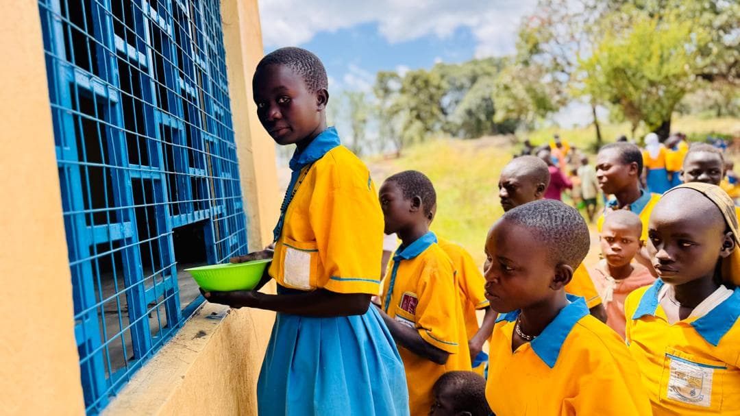 Children benefiting from the school feeding programme in Karamoja