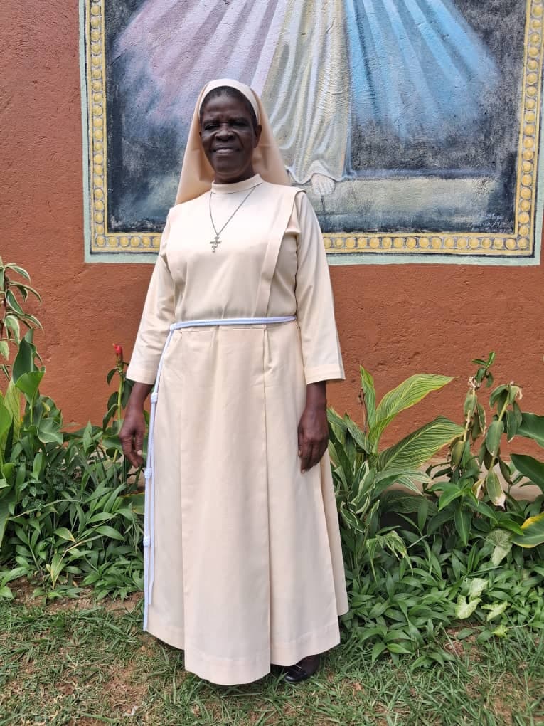 Mama Kevina standing